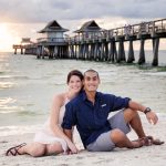 The couple is next to Naples Pier